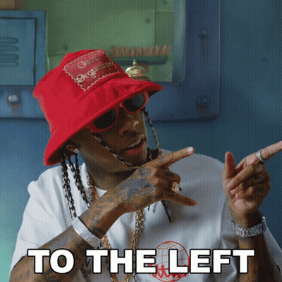 Man In Red Bucket Hat And Sunglasses Pointing Left GIF