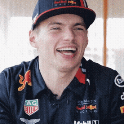 Man In Red Bull Hat And Polo Shirt Smiling GIF