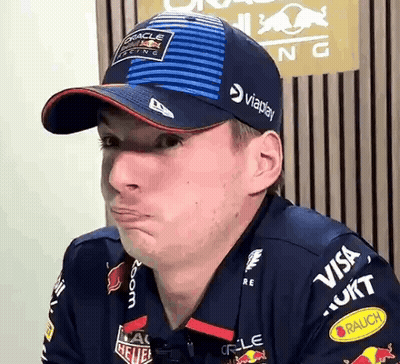 Man in Red Bull Hat Making Funny Face