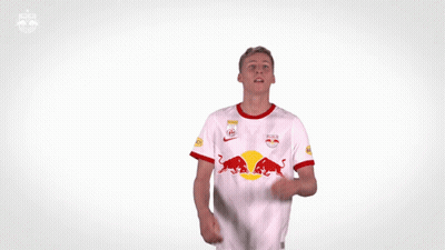 Man In Red Bull Jersey Looking At Ball GIF