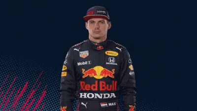 Man in Red Bull Racing Jacket and Hat