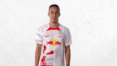 Man In Red Bull Shirt Holding Basketball GIF