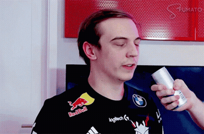 Man In Red Bull Shirt Holding Soda Can GIF