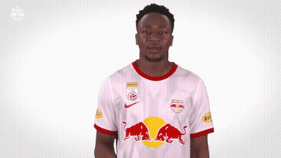 Man In Red Bull Shirt Pointing To Chest GIF