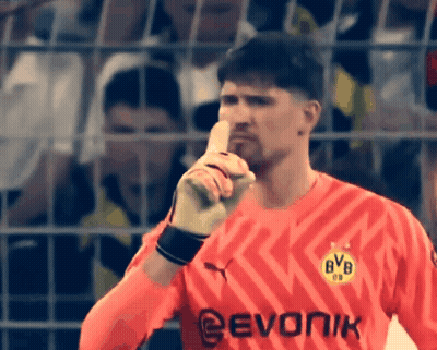 Man In Red BVB Jersey With Finger To Mouth GIF