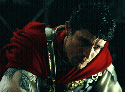 Man In Red Cape And Gold Armor GIF