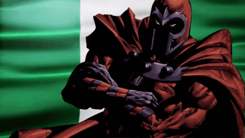 Man In Red Cape Standing In Front Of Green Background GIF