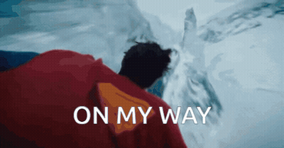Man In Red Cape Walking In Snow Saying On My Way GIF