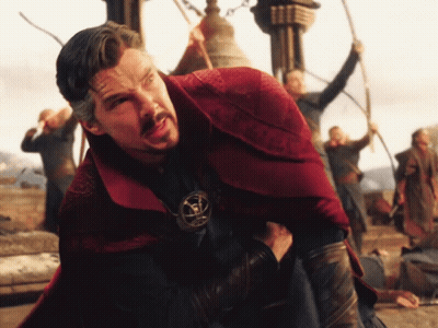 Man In Red Cape With Doctor Strange Pendant GIF