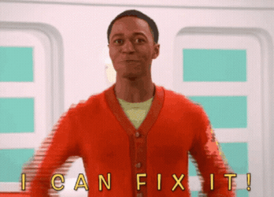 Man In Red Cardigan In Front Of I Can Fix It Sign GIF