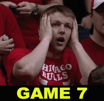 Man In Red Chicago Bulls Shirt Holds Head GIF