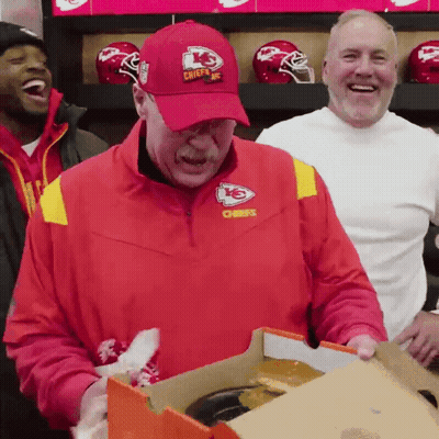 Man In Red Chiefs Jacket Holding Box GIF