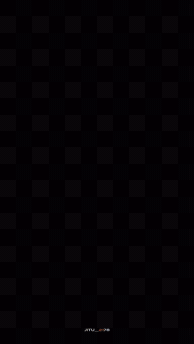 Man In Red Coat Walking Down Path GIF