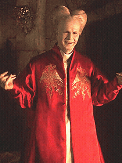 Man In Red Coat With Dragon GIF