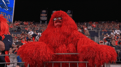 Man In Red Costume At Super Bowl GIF