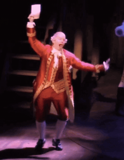 Man In Red Costume Holding Paper GIF