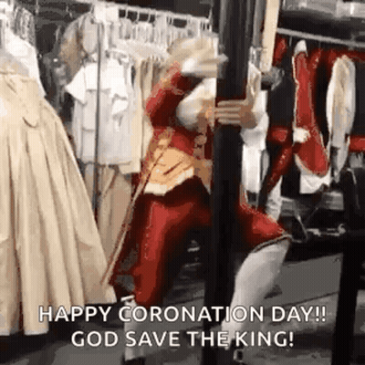 Man In Red Costume Holding Sword By Pole GIF