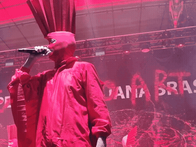 Man In Red Costume Singing Into Microphone Ana Bras GIF