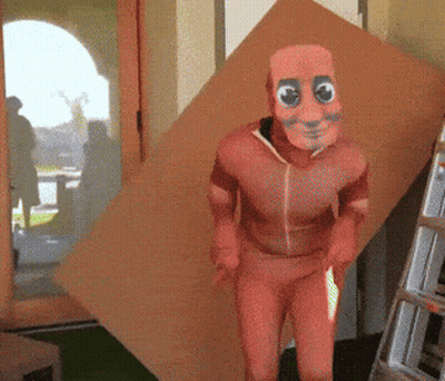 Man In Red Costume With Paper Face GIF