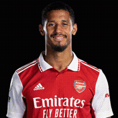 Man In Red Emirates Fly Better Shirt GIF