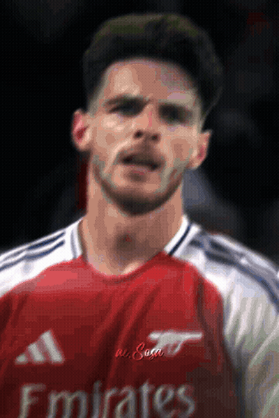 Man In Red Emirates Jersey Close Up GIF