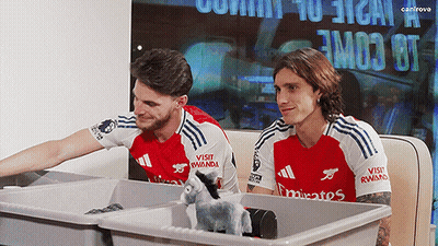 Man In Red Emirates Jersey Close Up GIF