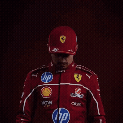 Man In Red Ferrari Racing Suit GIF