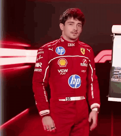 Man In Red Ferrari Racing Suit GIF