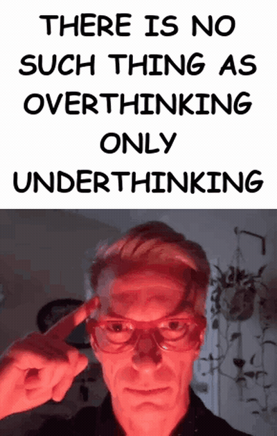 Man In Red Glasses Pointing At Forehead There Is No Such Thing As Overthinking Only Underth GIF