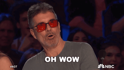 Man In Red Glasses Saying Oh Wow GIF