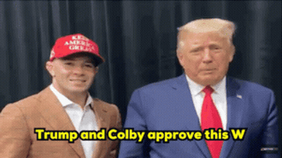 Man In Red Hat And Suit Saying Trump And Colby Approve This W GIF