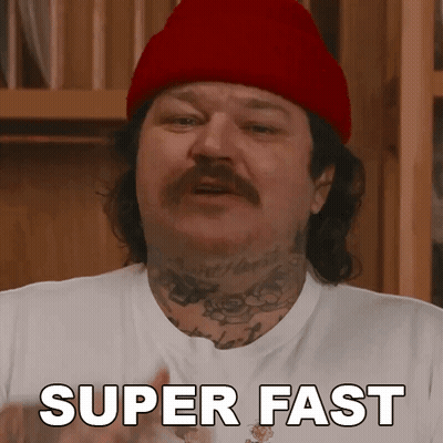 Man In Red Hat And White Shirt Saying Super Fast GIF