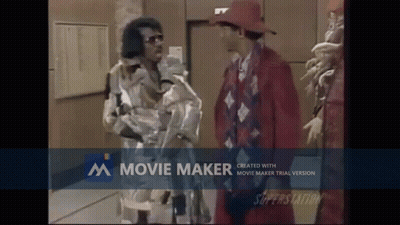 Man In Red Hat Beside Man In Red Suit GIF