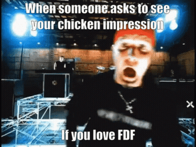 Man In Red Hat Funny Face Chicken Impression GIF