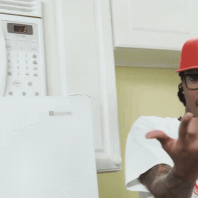 Man In Red Hat Giving Middle Finger GIF