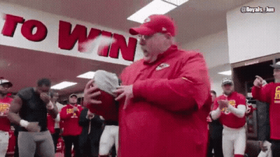 Man In Red Hat Holding Football Saying To Win GIF