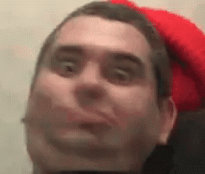 Man In Red Hat Making Funny Face GIF