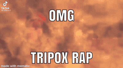 Man In Red Hat Making Funny Face Saying OMG Tripox Rap GIF