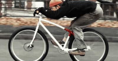 Man In Red Hat Riding Bike GIF