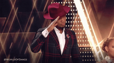 Man In Red Hat Saluting On World Of Dance GIF