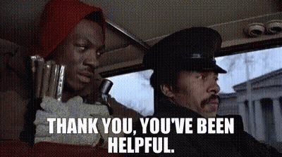 Man In Red Hat Sitting In Car Next To Police Officer GIF