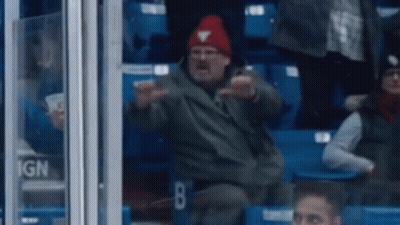 Man In Red Hat Sitting In Stadium GIF