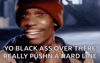 Man In Red Hat Smiling Saying Yo Black Ass Over There Really Pushn A Hard Line GIF