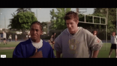 Man In Red Hat Smiling Saying You Got Anymore Of That Covid Or Omarion Left In You GIF