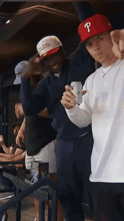 Man In Red Hat With Letter P Holding Beer GIF