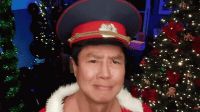 Man in Red Hat With Letter S