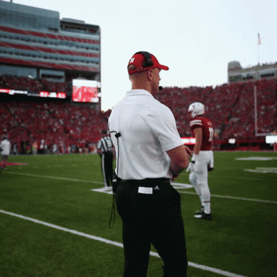 Man In Red Hat With Letter T GIF