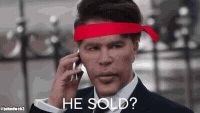 Man in Red Headband Talking on Cell Phone Saying He Sold