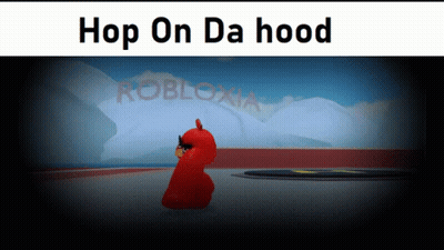 Man In Red Helmet And Leather Jacket Holding Two Guns GIF