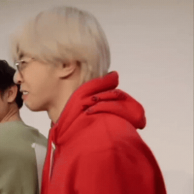 Man In Red Hoodie And Glasses Beside Man In Green Shirt GIF